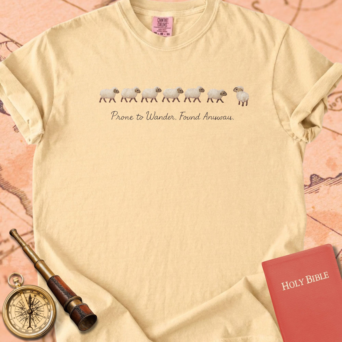 Prone to Wander, Found Anyway — Tiny Sheep Premium T-shirt — Butter Comfort Colors