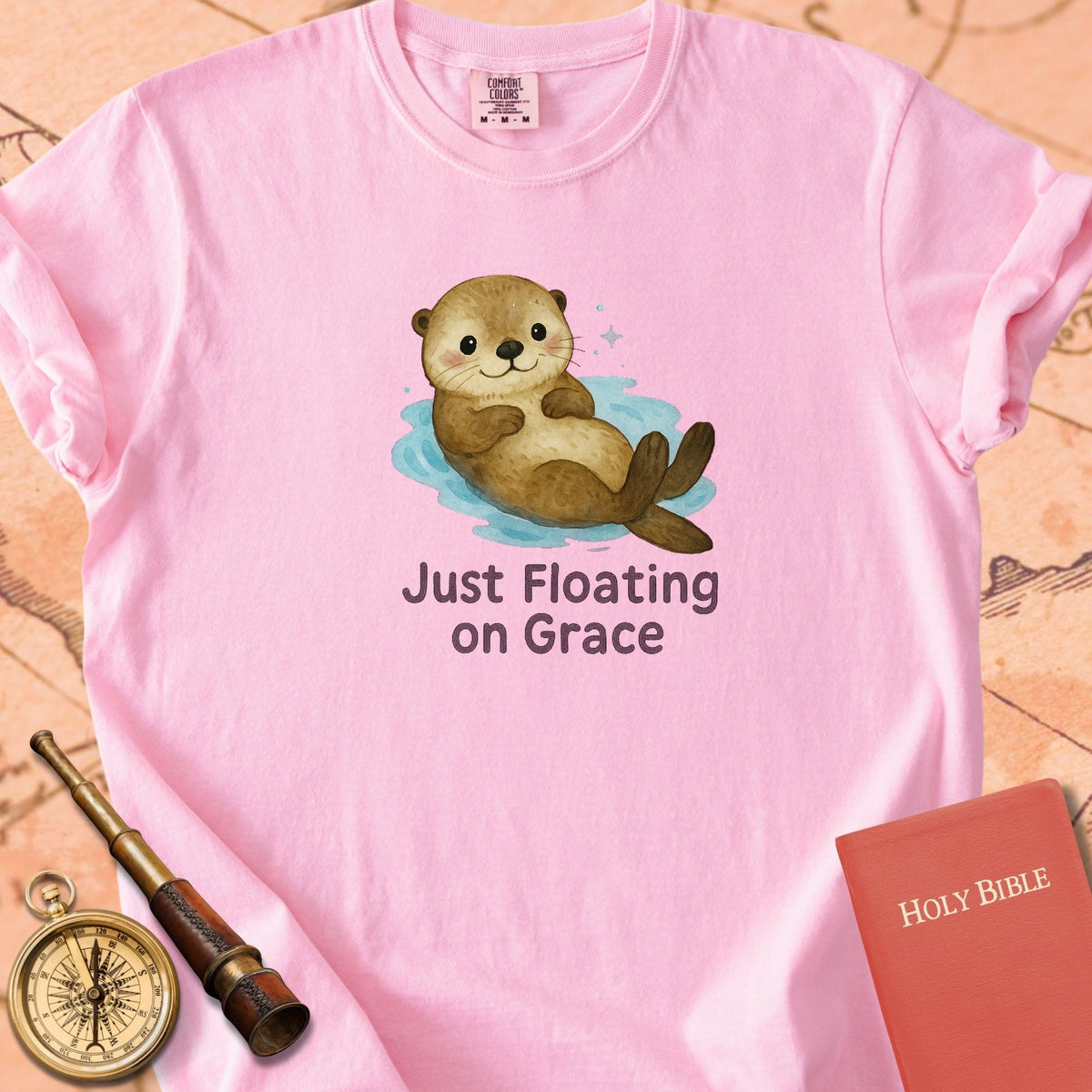 Just Floating on Grace — Cute Otter Premium T-shirt — Blossom Comfort Colors
