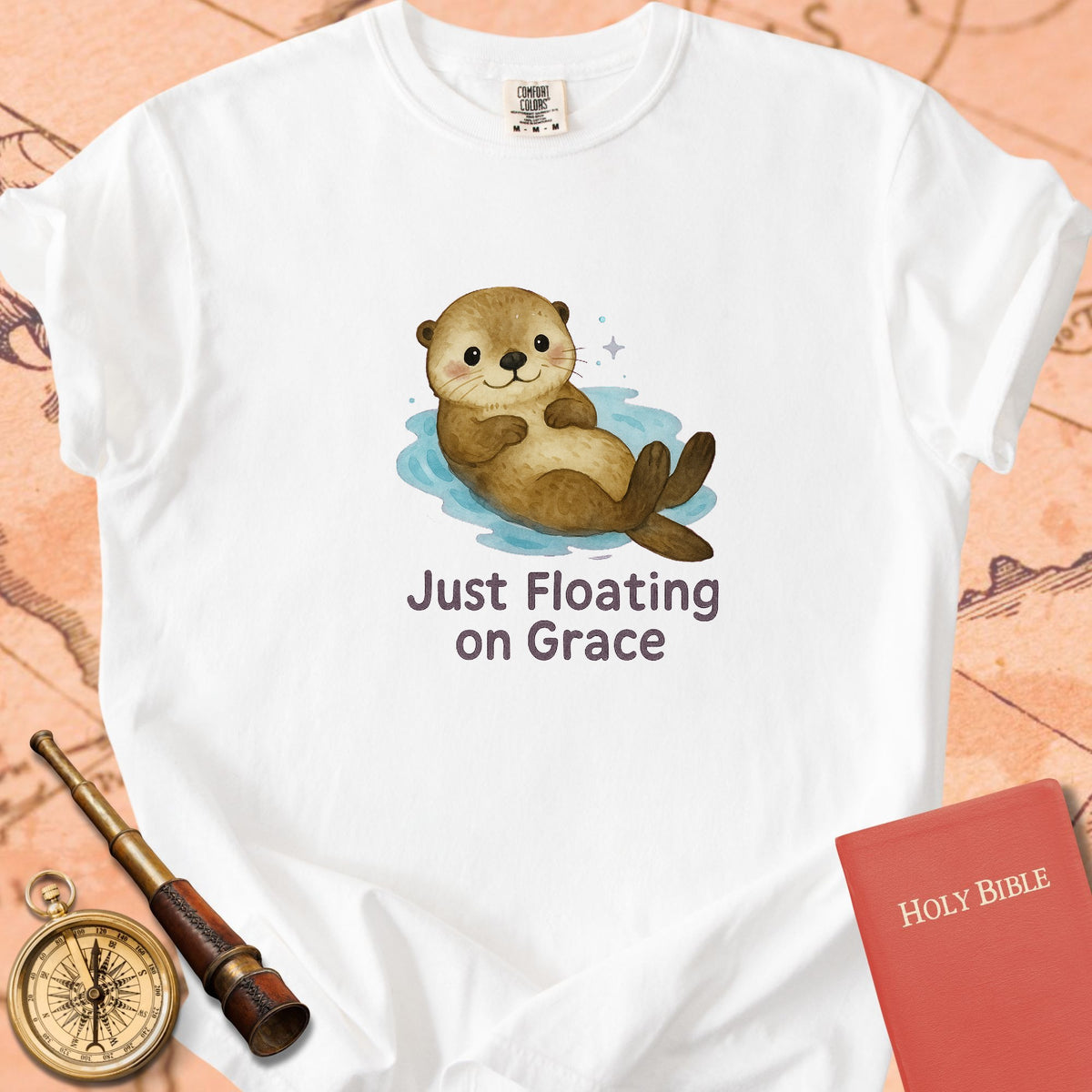 Just Floating on Grace — Cute Otter Premium T-shirt — White Comfort Colors