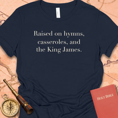 Raised on Hymns, Casseroles and the King James. Women's Tee