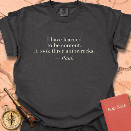 I Have Learned to Be Content. It Took Three Shipwrecks. —Paul. Premium T-Shirt