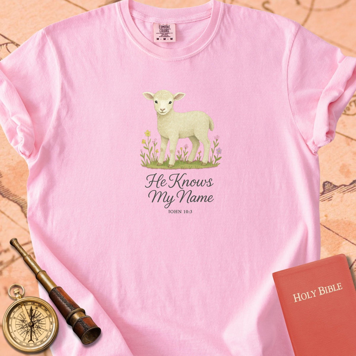He Knows My Name — Lamb Premium T-shirt — Blossom Comfort Colors