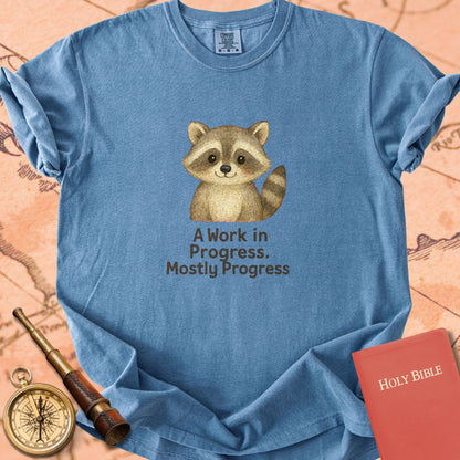 A Work in Progress, Mostly Progress — Cute Raccoon Premium T-shirt — Blue Jean Comfort Colors