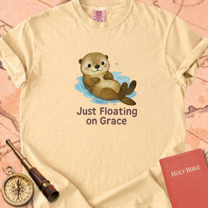 Just Floating on Grace — Cute Otter Premium T-shirt — Butter Comfort Colors